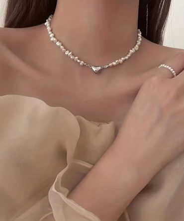 Add a touch of love to your outfit with our Exquisite Irregular Faux Pearl Love Pendant Necklace for Women