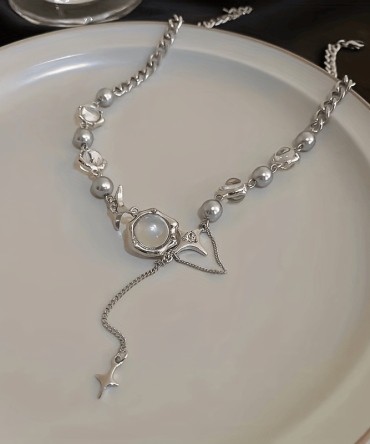 Add a touch of Y2K and Hip Hop style to your look with our Moonlight Zircon Cross Tassel Necklace - perfect for casual and party occasions!